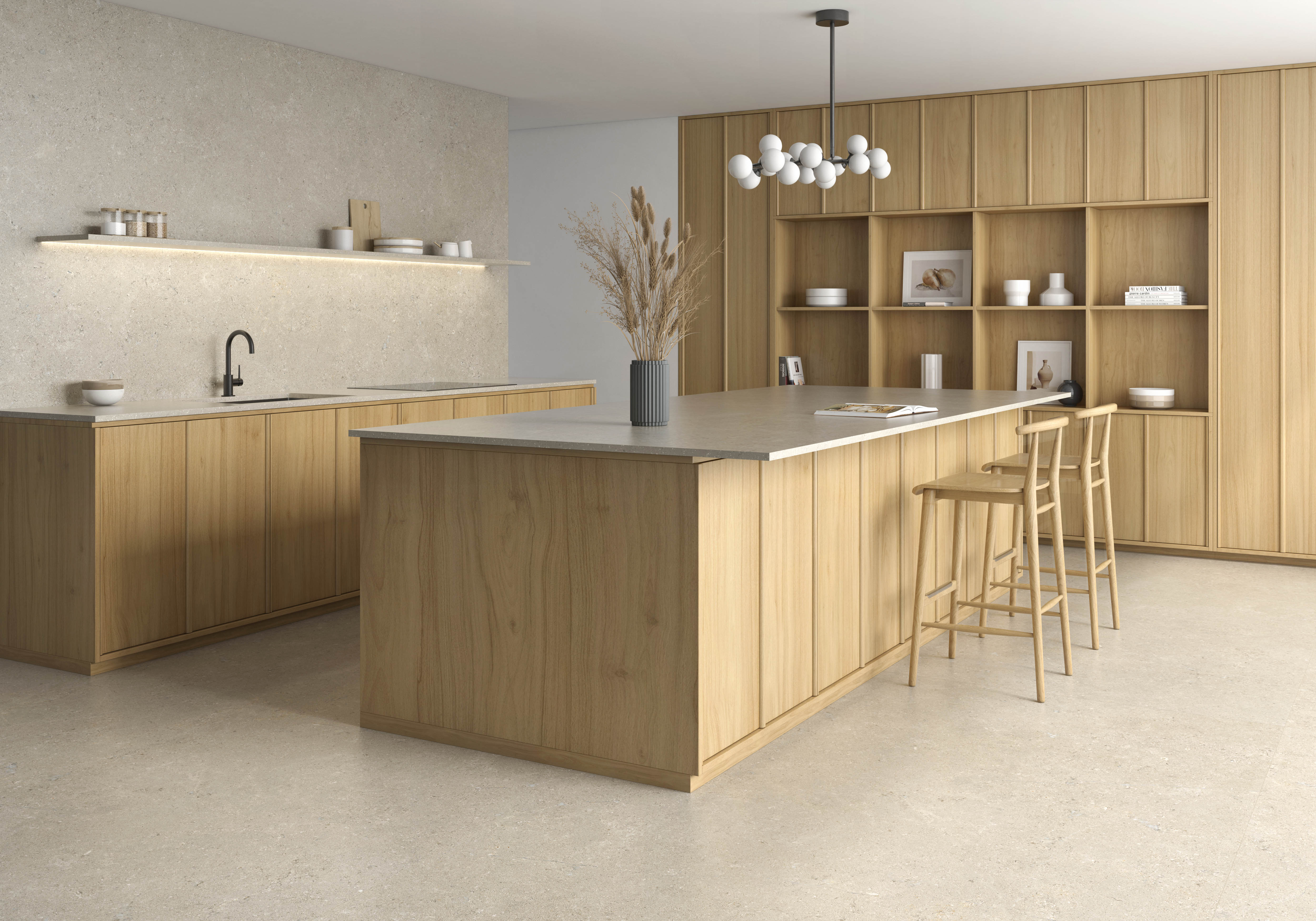 Cocina con encimera y revestimiento de pared con piedra de gran formato
