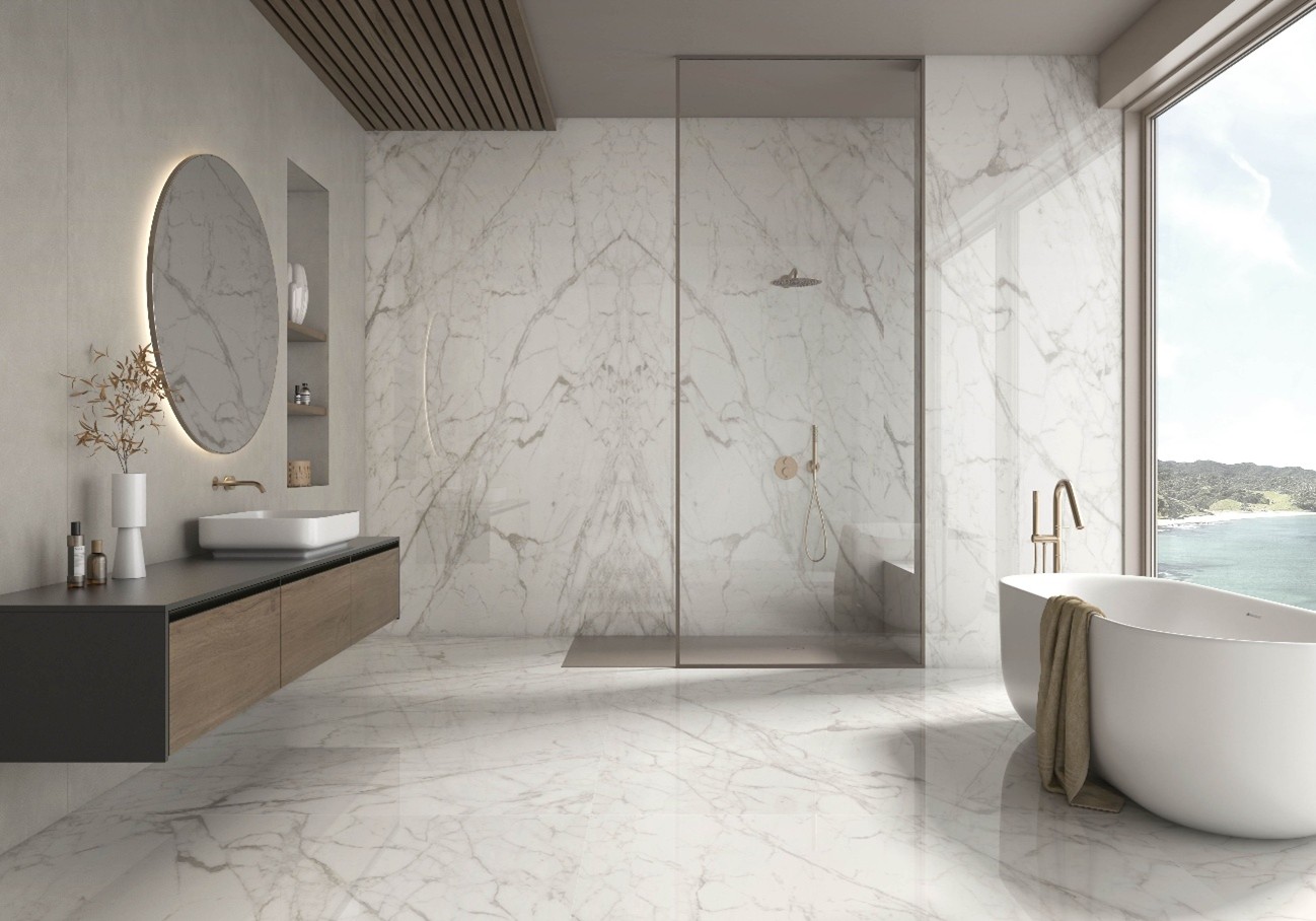 bathroom with views clad in sintered stone with a marble finish